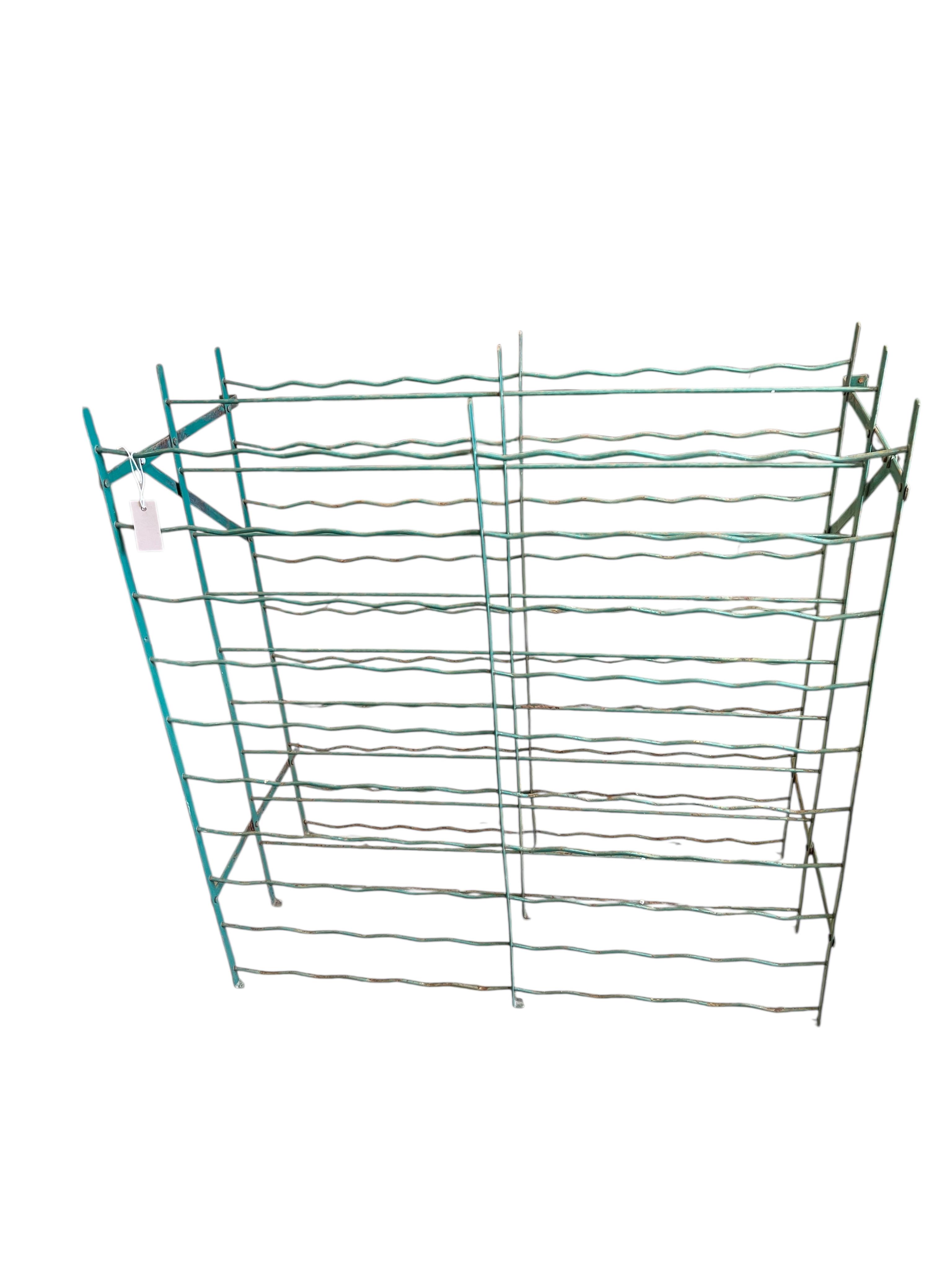 Two French painted wrought iron wine cages, width 101cm, depth 47cm, height 102cm